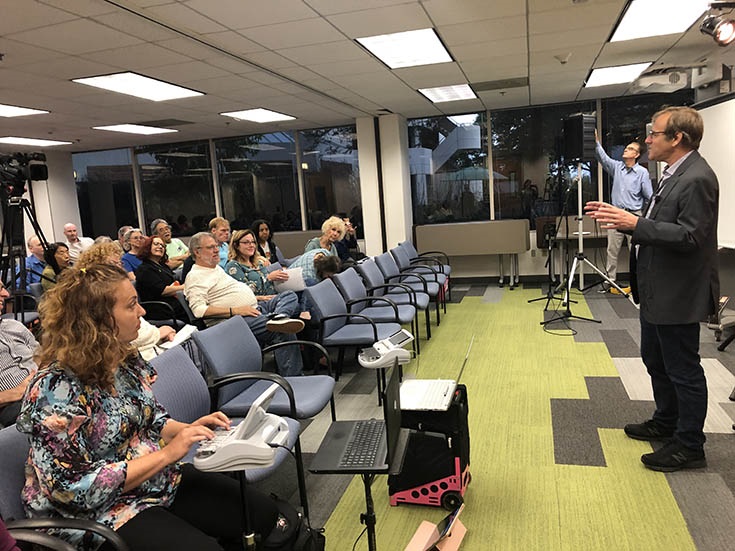 Speaker Series event on 'Housing Affordability.' June 19, 2019. The event speaker, Randy Shaw, presents in front of the audience.