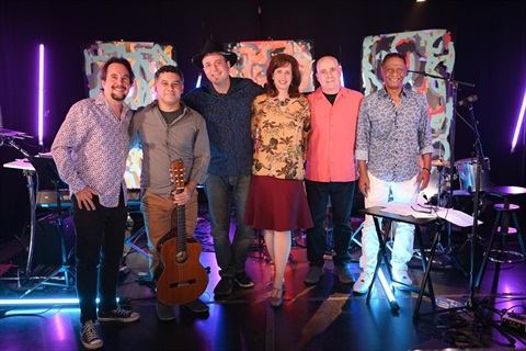 brazil arts connection ensemble posed for a photo on stage
