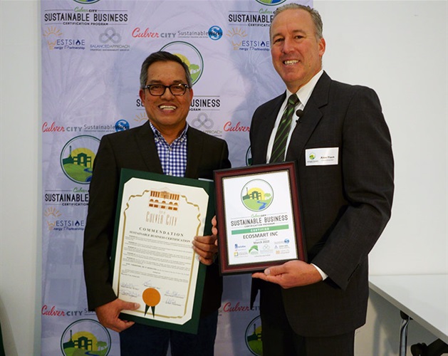 Council Member Alex Fisch presenting Sustainable Certificate to EcoSmart Fire