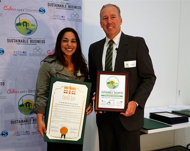 Council Member Alex Fisch presenting Sustainable Certificate to the Law Offices Elsa Martinez