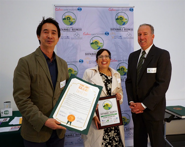 Council Member Alex Fisch presenting Sustainable Certificate to Poon Design