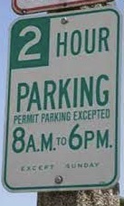 Image of 2 hour parking sign, permit parking excepted 8 am to 6 pm, except Sunday