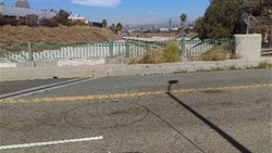 2021 photograph of Higuera St bridge crossing over Ballona Creek, showing street lanes