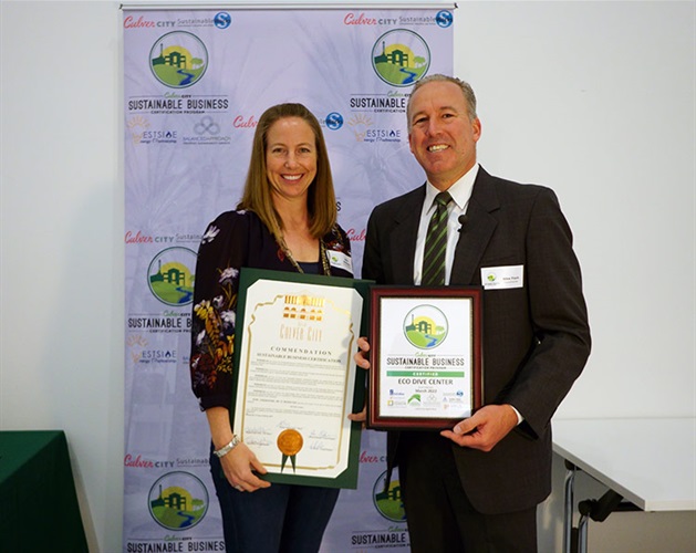 Council Member Alex Fisch presenting Sustainable Certificate to Eco-Dive Center