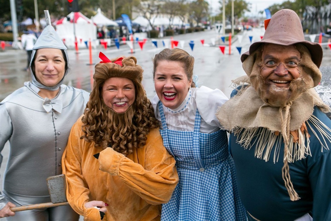 Four people dressed as Wizard of Oz characters for Screenland 5K Run