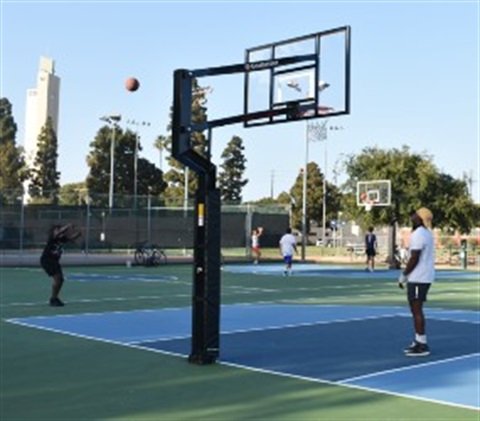 People Playing Basketball in Late Afternoon at Vets Park