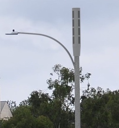 Photograph showing cell site attached to street light