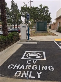 Photograph of EV charging only parking space with EVGo charger