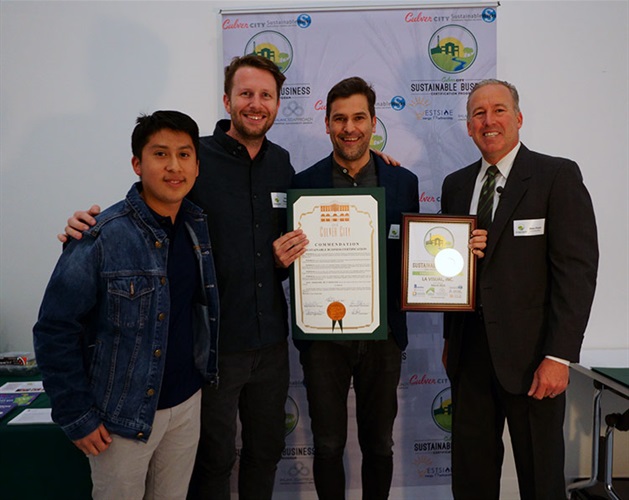 Council Member Alex Fisch presenting Sustainable Certificate to LA Visual