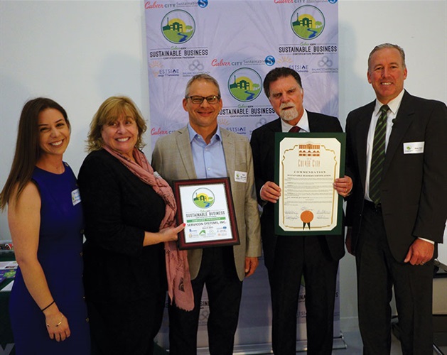 Council Member Alex Fisch presenting Sustainable Certificate to Servicon