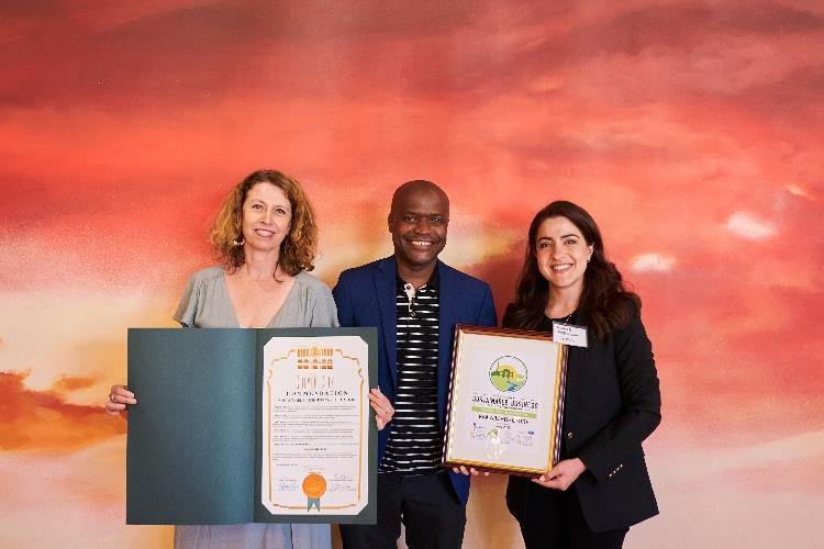 Photograph of Mayor Daniel Lee and representatives from KFA receiving Sustainable Business Certificate at event Jun 2022