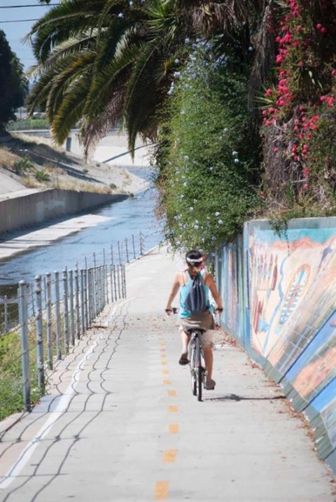 Photograph of La Ballona Bike Path with bicyclist, showing artwork