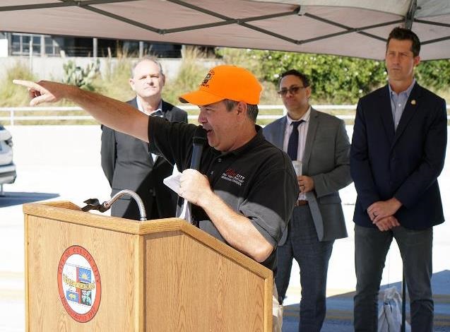 Higuera Bridge Opening Event featuring from Culver City's Senior Engineer and Project Manager Sammy Romo and Engineering Manager Mate Gaspar, Public Works Director Yanni Demitri, and Council Member Dan O'Brien in the background.