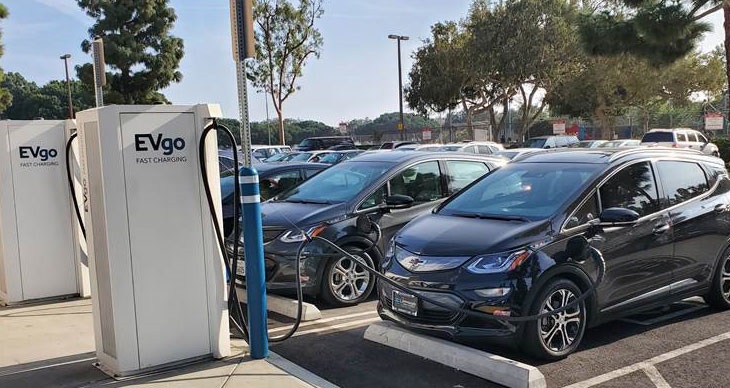 Photograph of cars plugged intoEVgo electric vehicle charging stations