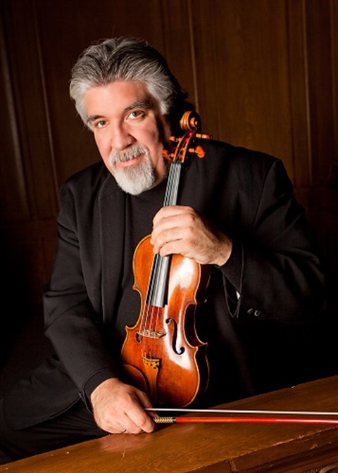 Andres Cardenes with violin