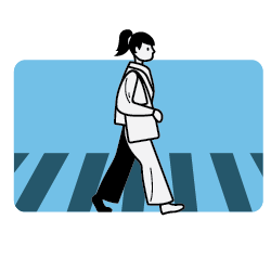 Person walking in a crosswalk