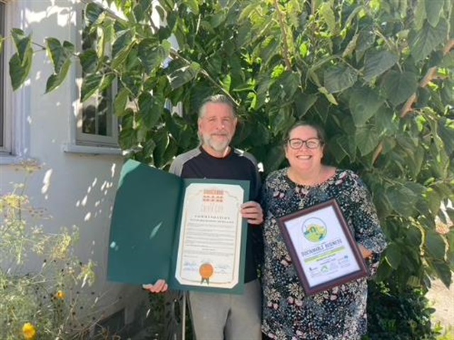 2019-2020 Sustainable Business Certificate presented to Jim McGrath and Patricia Hunter McGrath from Branches Atelier