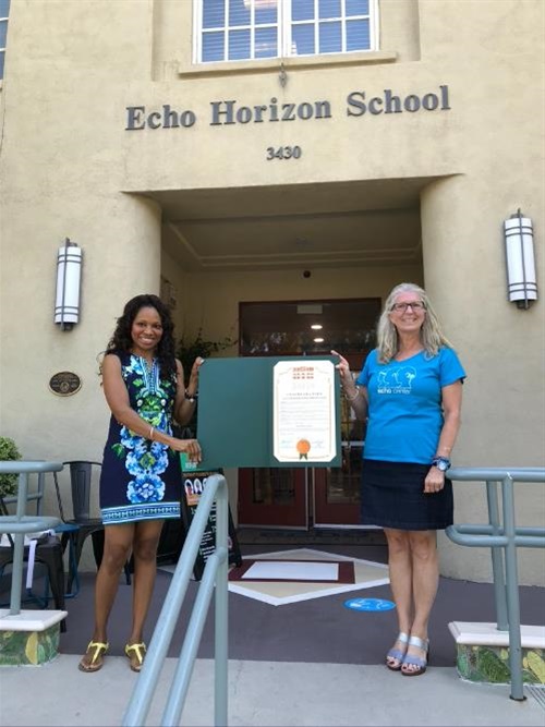 2019-2020 Sustainable Business Certificate presented to Abeni Bias and Peggy Procter from Echo Horizon School