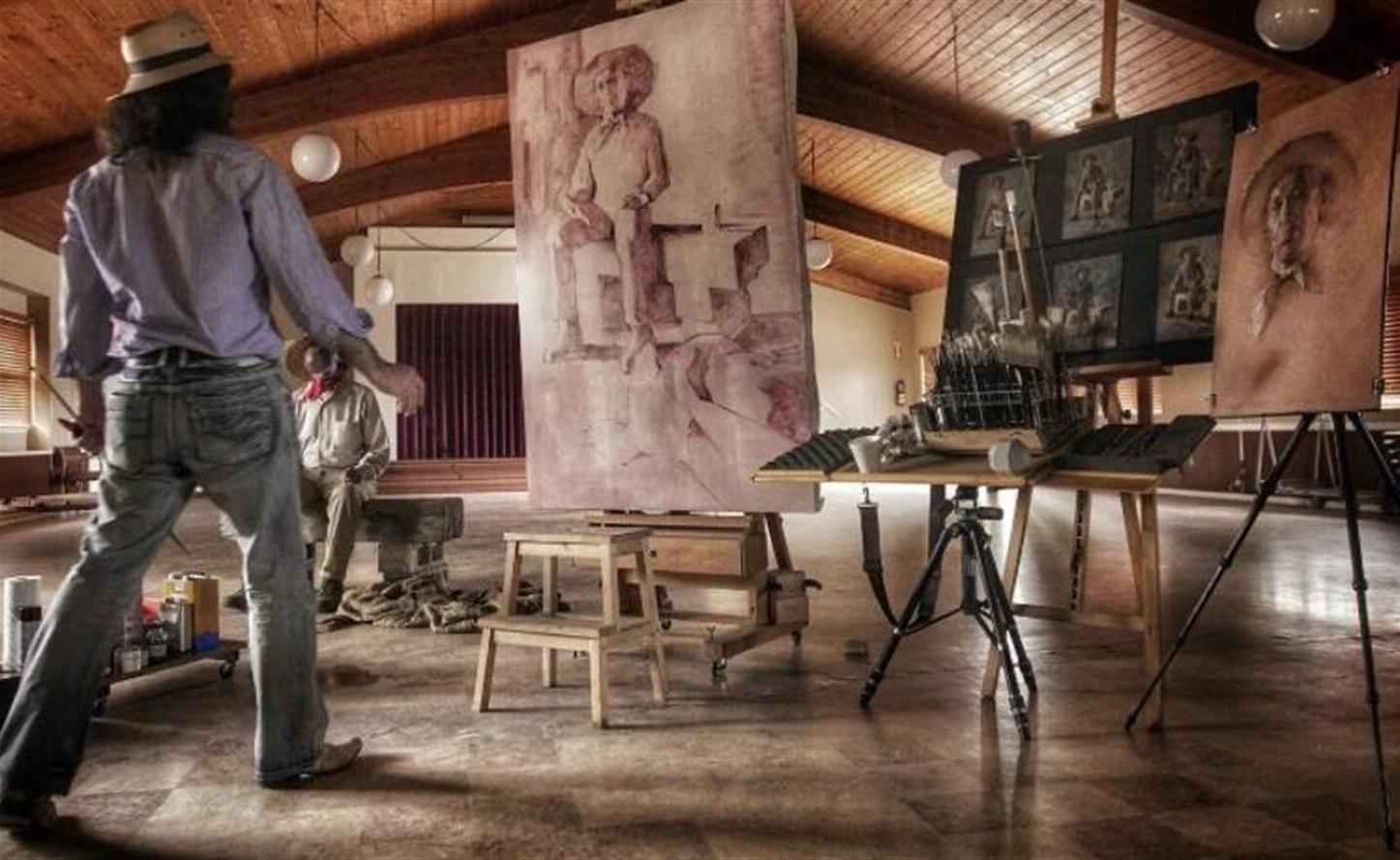 Culver City Artist Laureate Alexey Steele at work in his studio, working on painting titled "El Rey Trabajador" in 2016